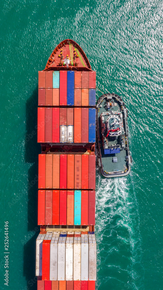 Container ship in export and import business logistics and transportation. Cargo and container box s