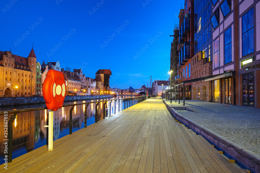 Beautiful old town of Gdansk with historic Crane at Motlawa river, Poland