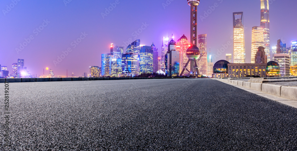 Empty asphalt road through Shanghai business district