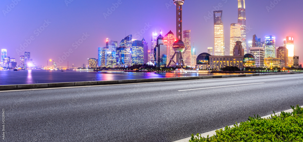 Empty asphalt road through Shanghai business district