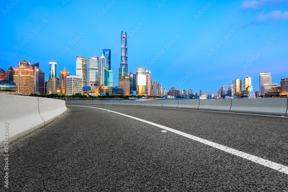 Empty asphalt road through Shanghai business district