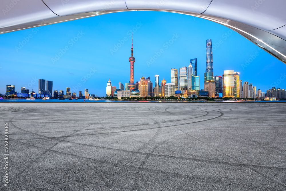 Empty asphalt square ground with panoramic city skyline in Shanghai,China