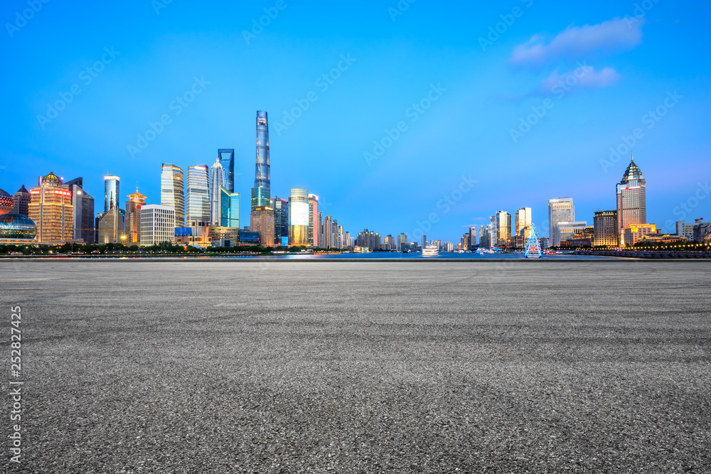 Empty asphalt square ground with panoramic city skyline in Shanghai,China