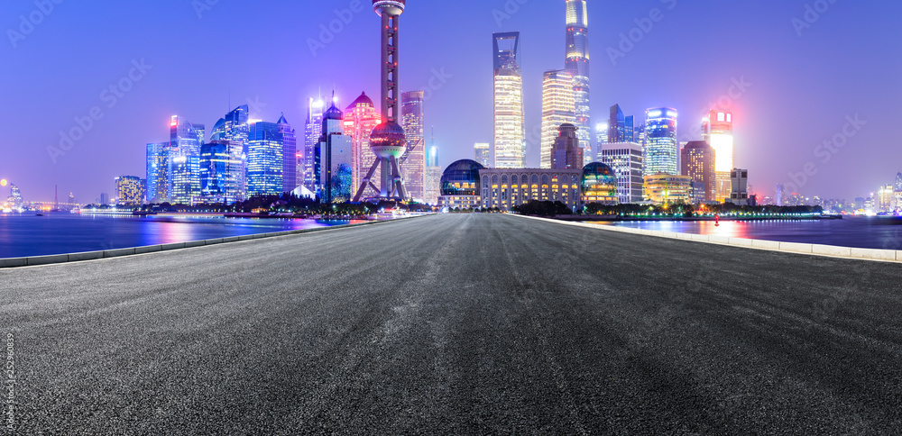 Empty asphalt road through Shanghai business district