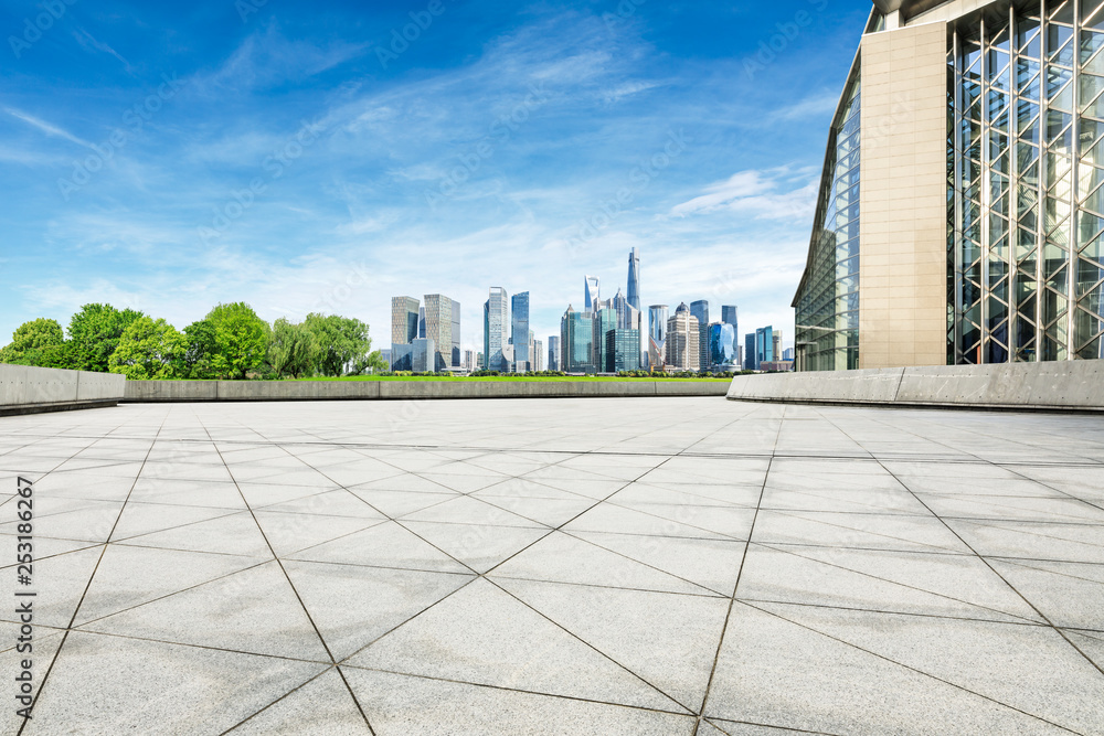 Empty square floor and panoramic city skyline with buildings in shanghai