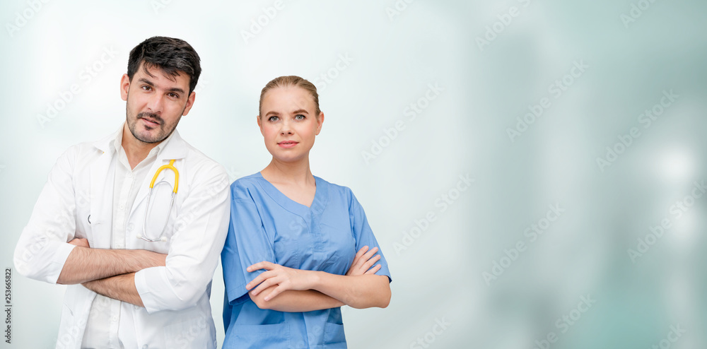 Doctors at hospital office working with another doctor. Healthcare and medical services.