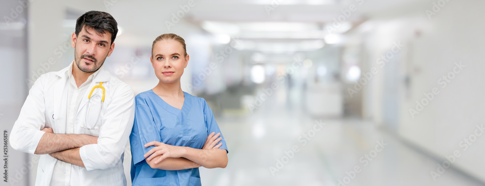 Doctors at hospital office working with another doctor. Healthcare and medical services.