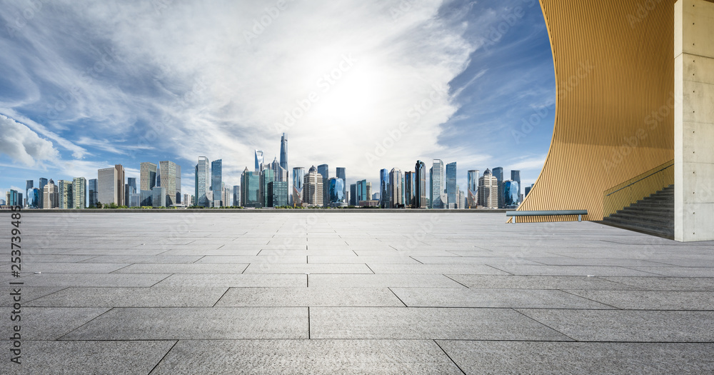 Empty square floor and panoramic city skyline with buildings in Shanghai