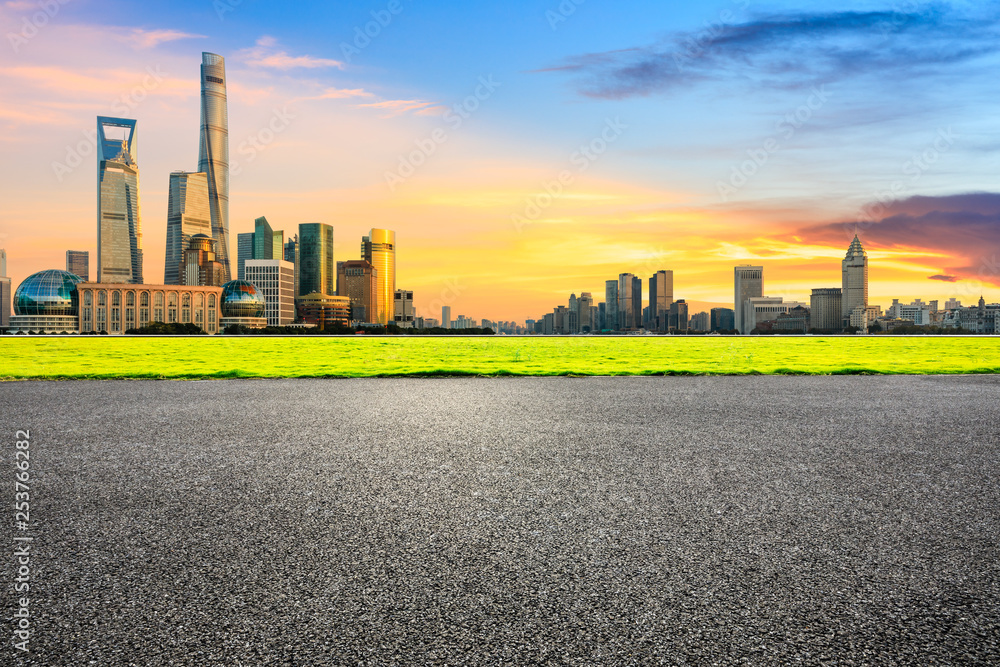 Empty asphalt road and modern city buildings in Shanghai