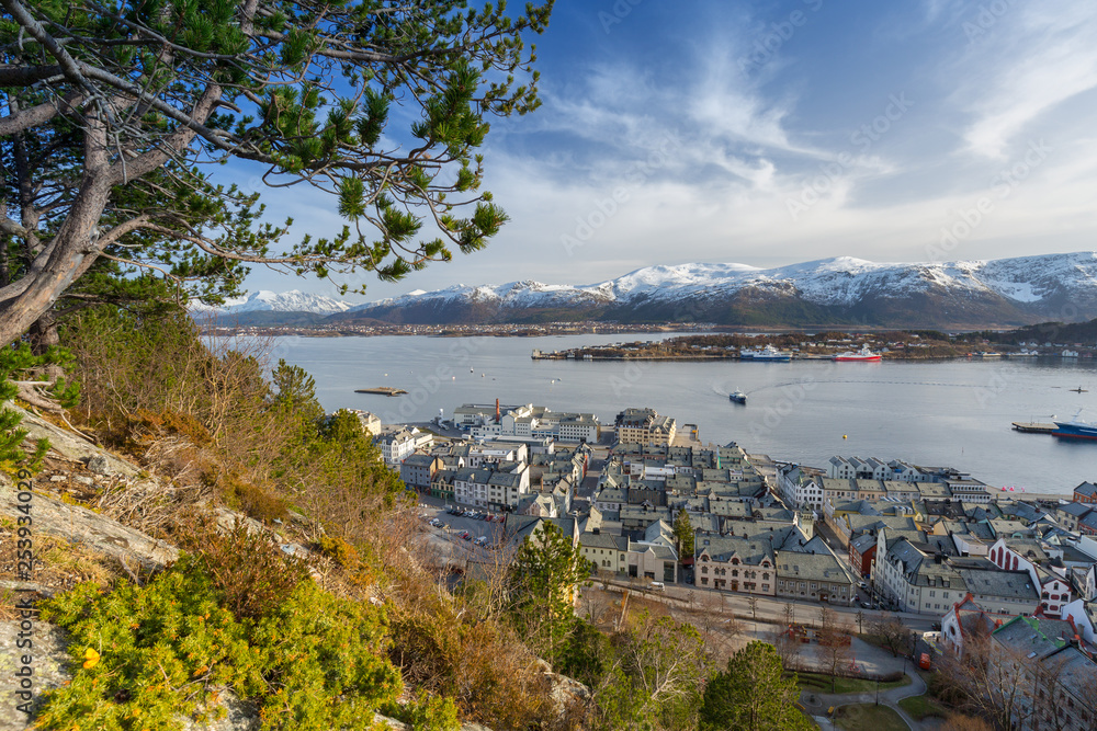 Alesund town and snowy mountains in Norway