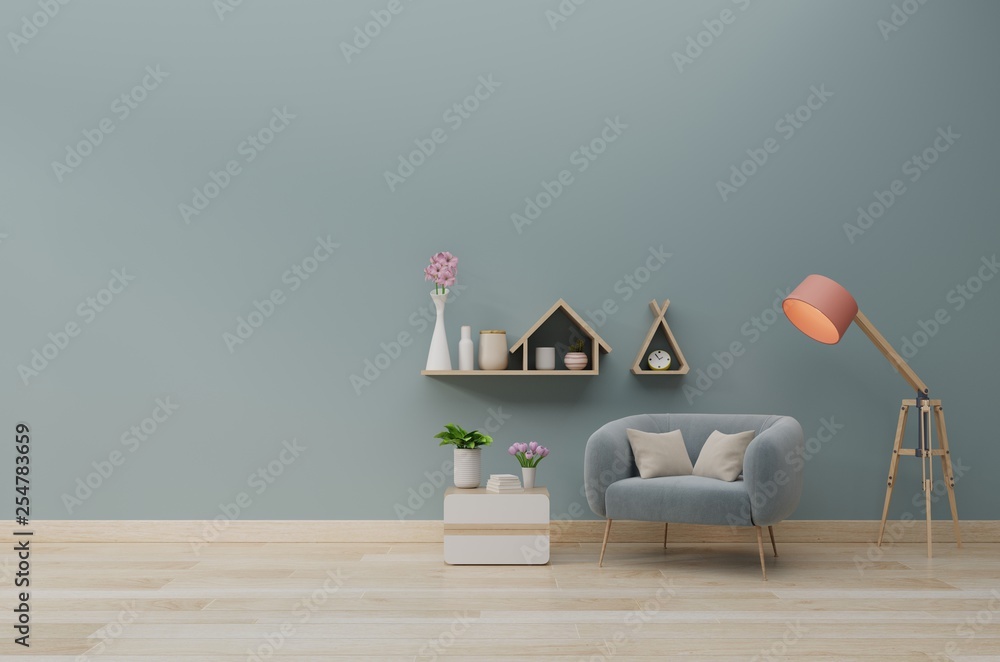 Modern living room with blue armchair have cabinet and wood shelves on wood flooring and blue wall ,