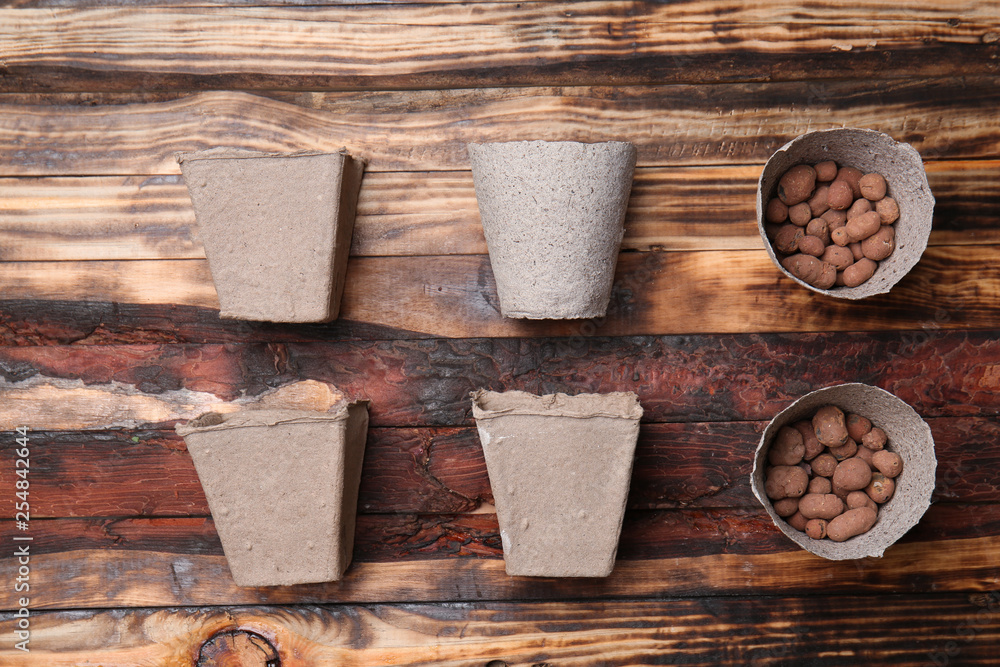 Pots for gardening on wooden background