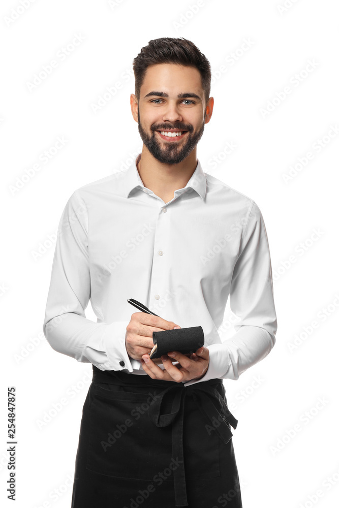 Handsome waiter with notebook on white background