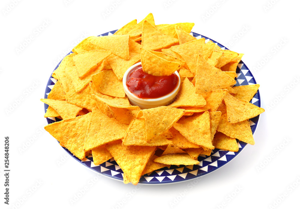 Plate with tasty nachos and tomato sauce on white background