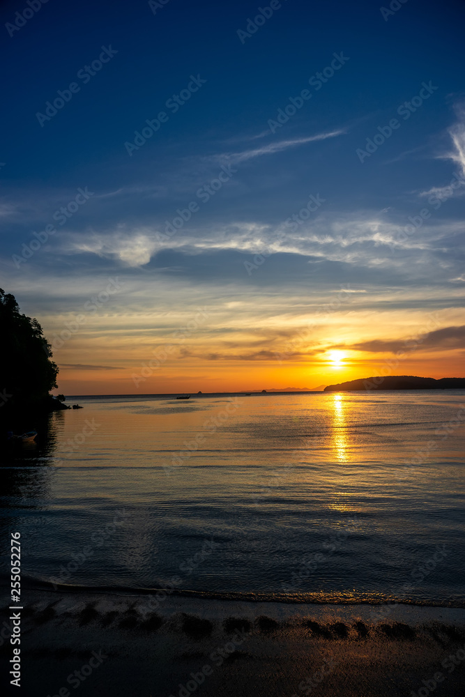 Beautiful sunset at the beach at Krabi Island, Thailand.