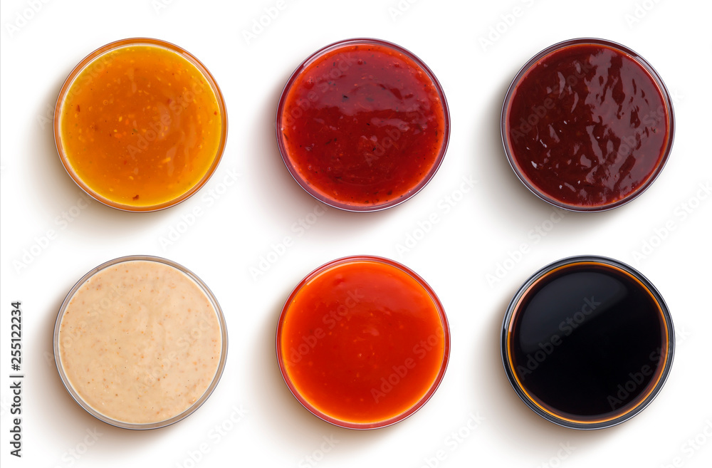 Different sauces isolated on white background, top view