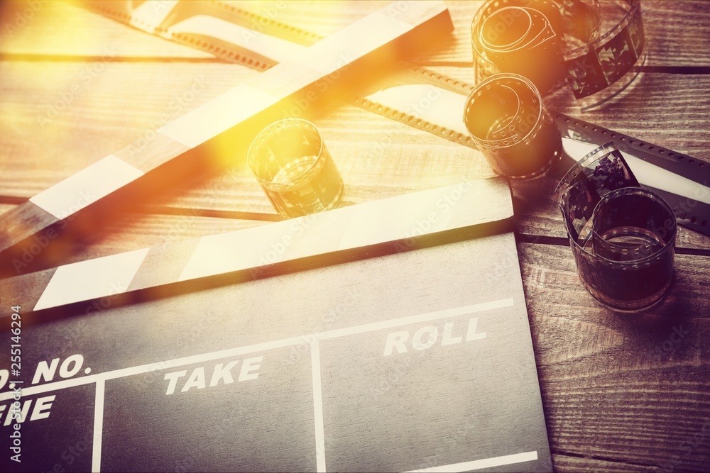 Movie clapper board on wooden background