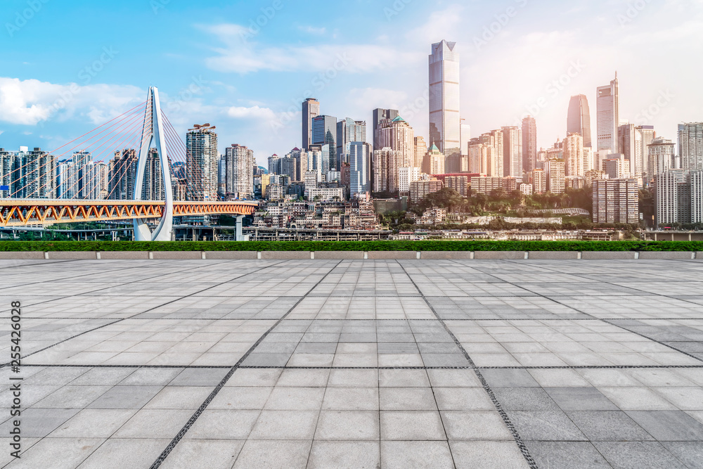 Urban skyscrapers with empty square floor tiles