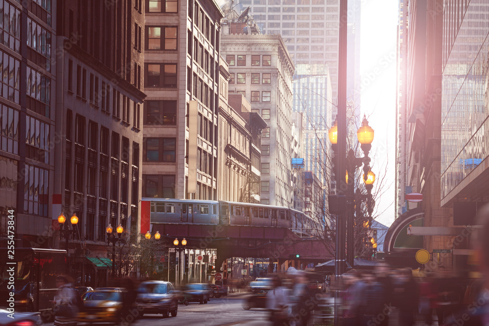 Busy street in Chicago downtown with metro line