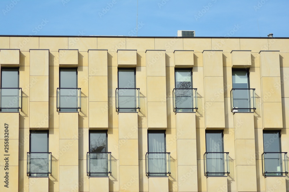 Multistory new modern apartment building. Stylish living block of flats. Modern, new executive apart