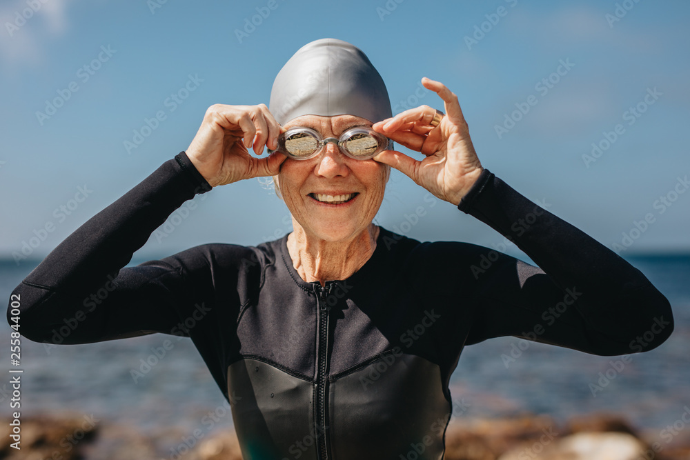 Senior woman enjoying a swim at the sea