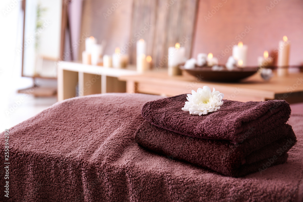 Clean towels on table in spa salon