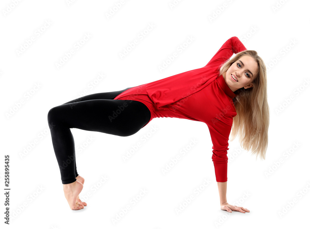 Young female dancer on white background