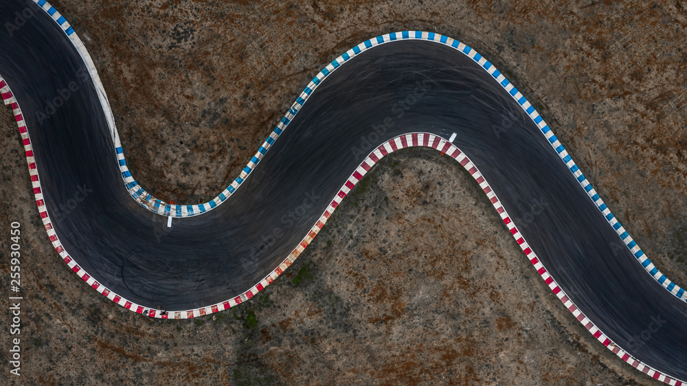 Curving race track view from above, Aerial view car race asphalt track and curve.