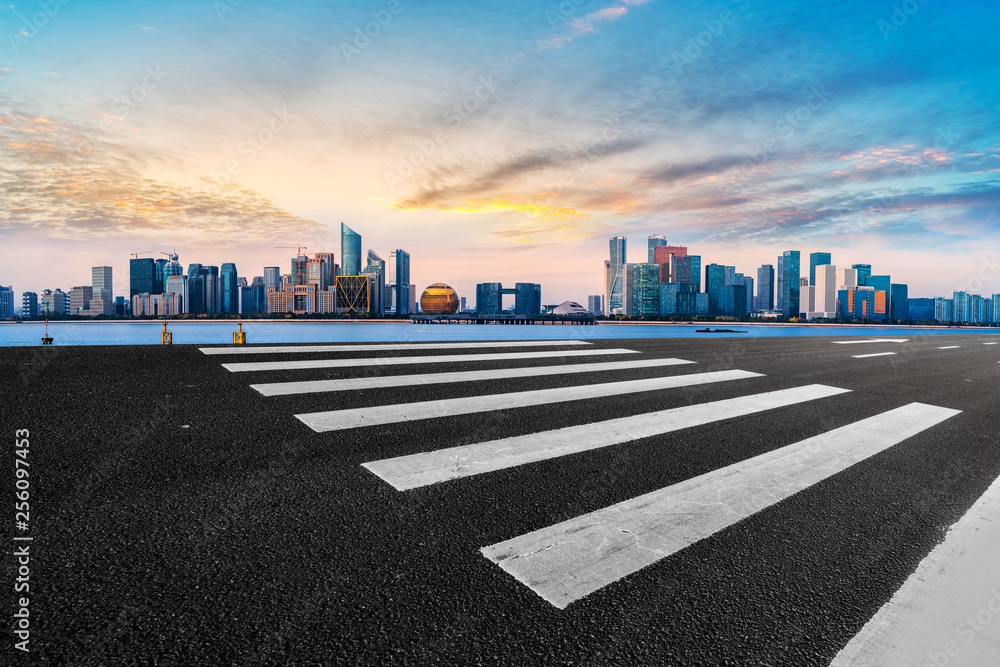 Foreground highway asphalt pavement city building commercial building office building