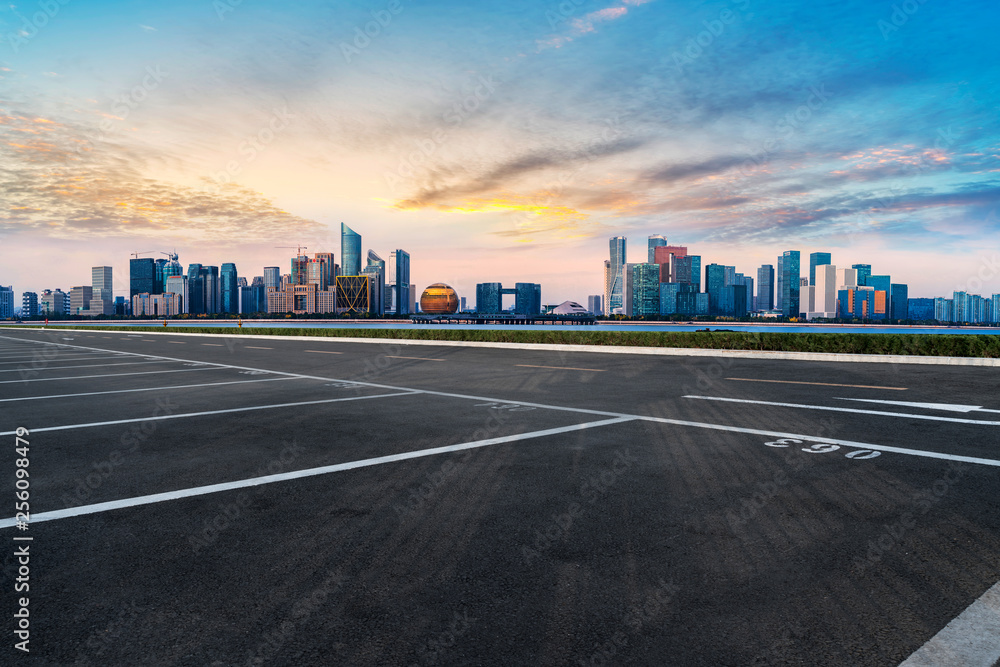 Foreground highway asphalt pavement city building commercial building office building