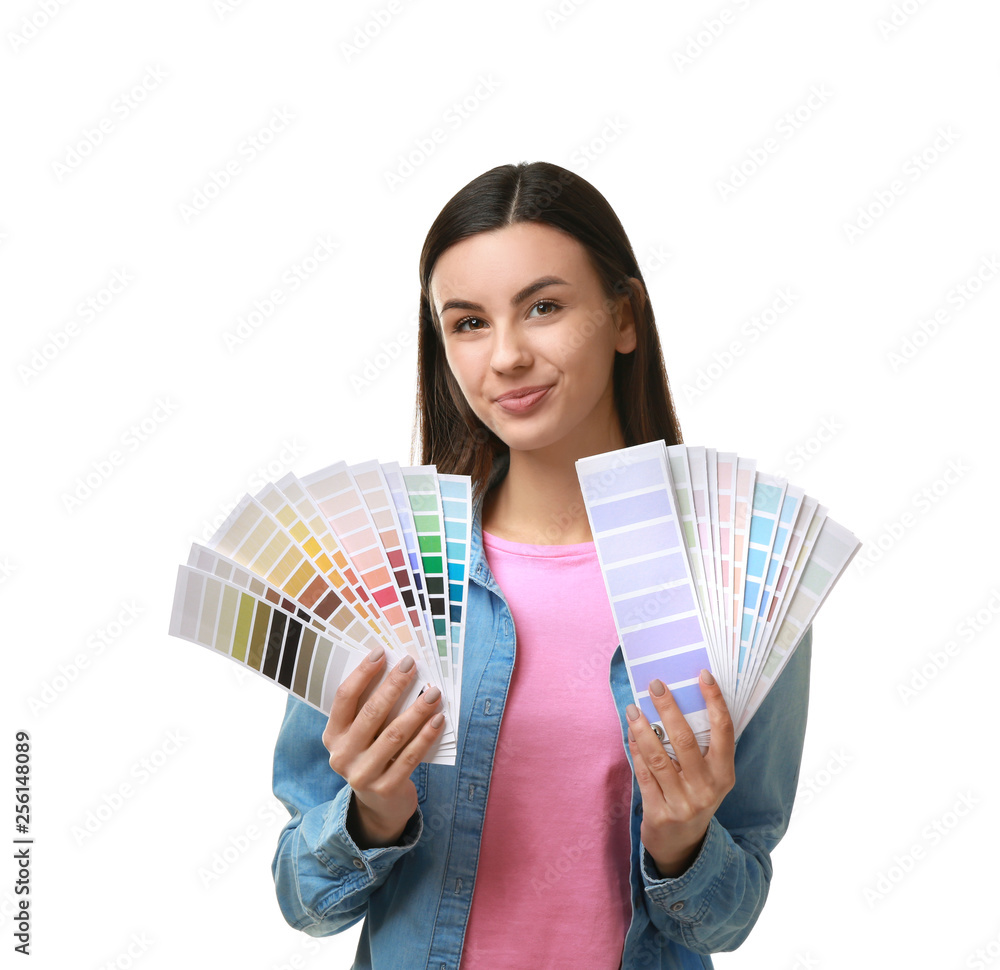 Female designer with color patterns on white background