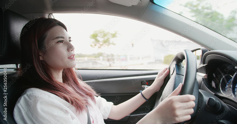 business woman driving car