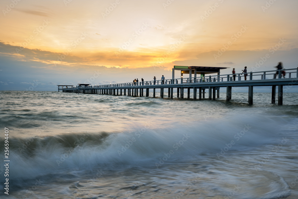 Wooden pier between sunset in Phuket, Thailand. Summer, Travel, Vacation and Holiday concept.