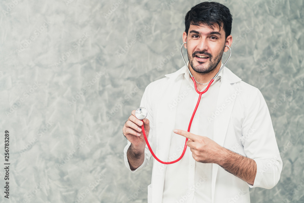 Young male doctor working at the hospital. Medical healthcare and doctor staff service.