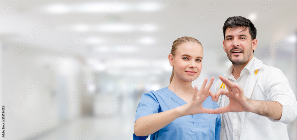 Doctors at hospital office working with another doctor. Healthcare and medical services.