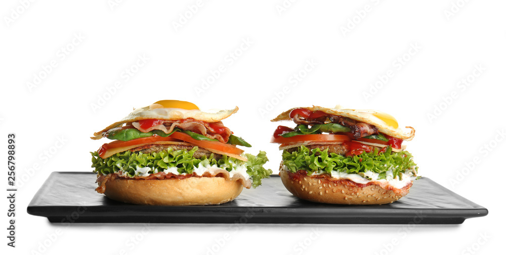 Tasty burgers on white background