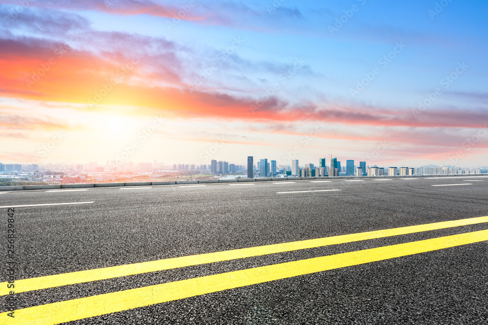 Asphalt highway passing through the city above in Shanghai at sunset