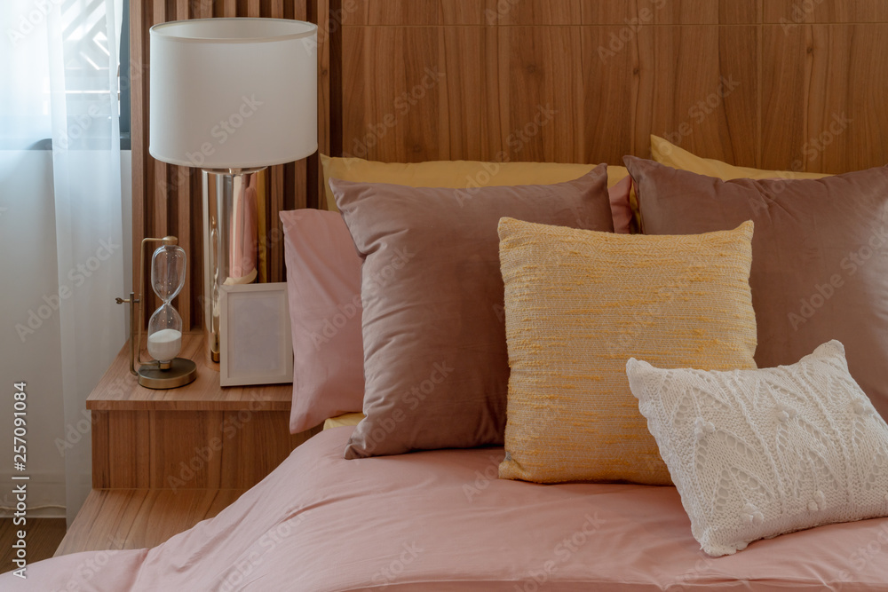 cozy bedroom with set of pillows