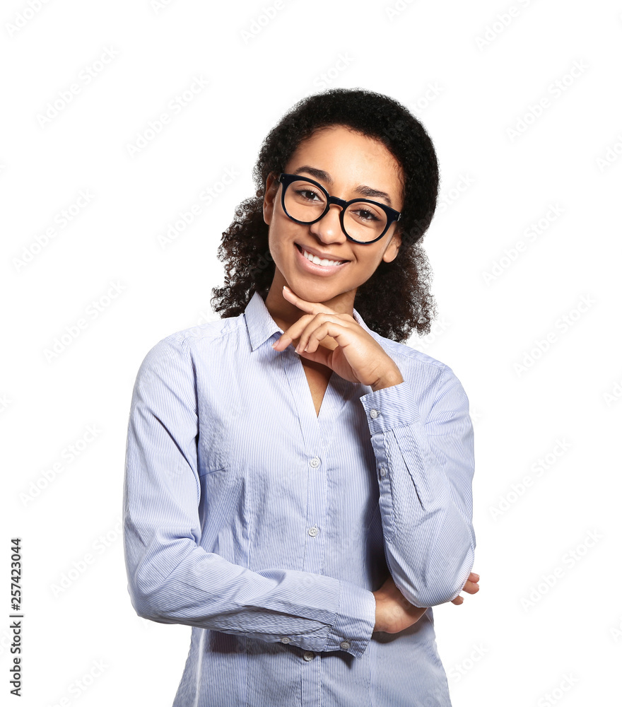 African-American woman in formal clothes on white background