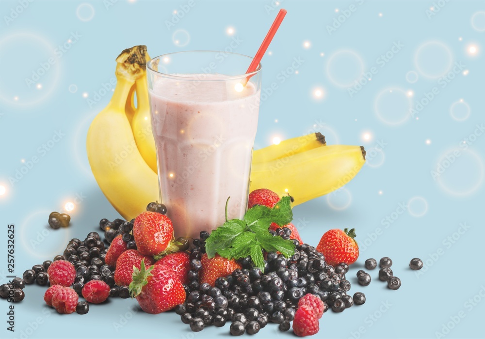 Healthy Fruit Smoothie in glass on wooden table Background