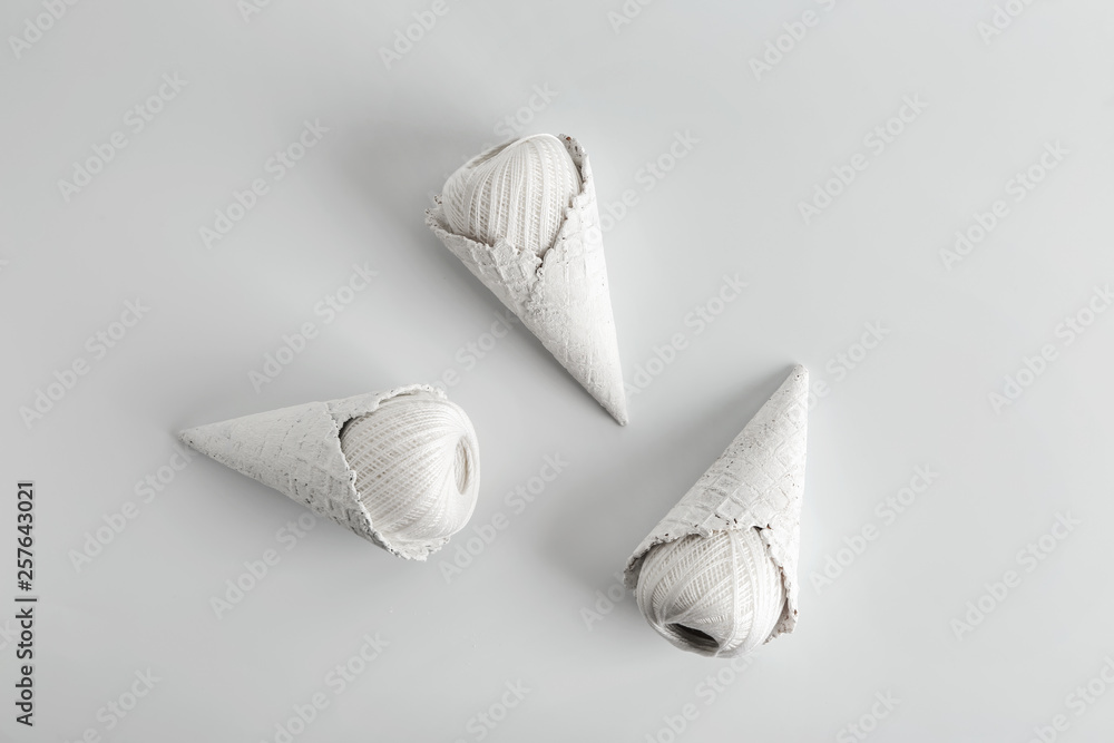 Wafer cones with clews on white background