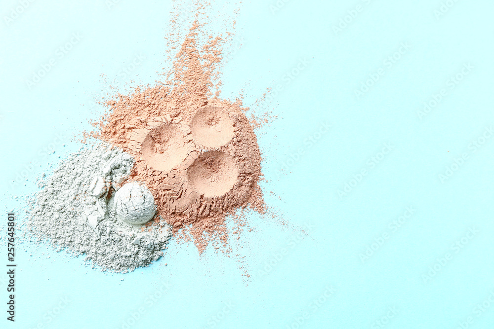 Cosmetic clays on color background