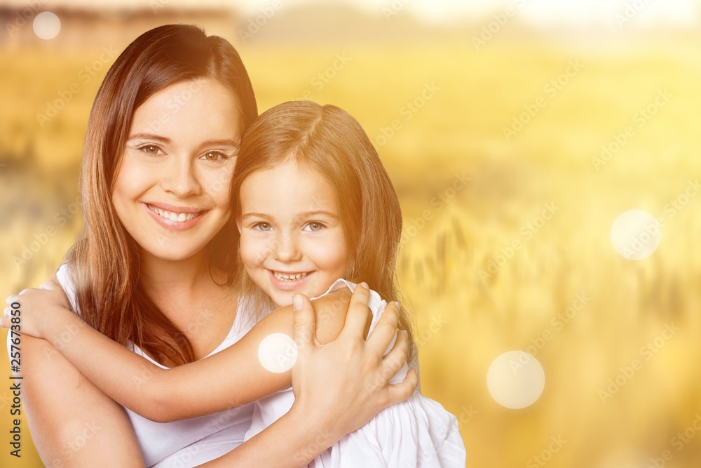 Happy Mother and daughter hugging