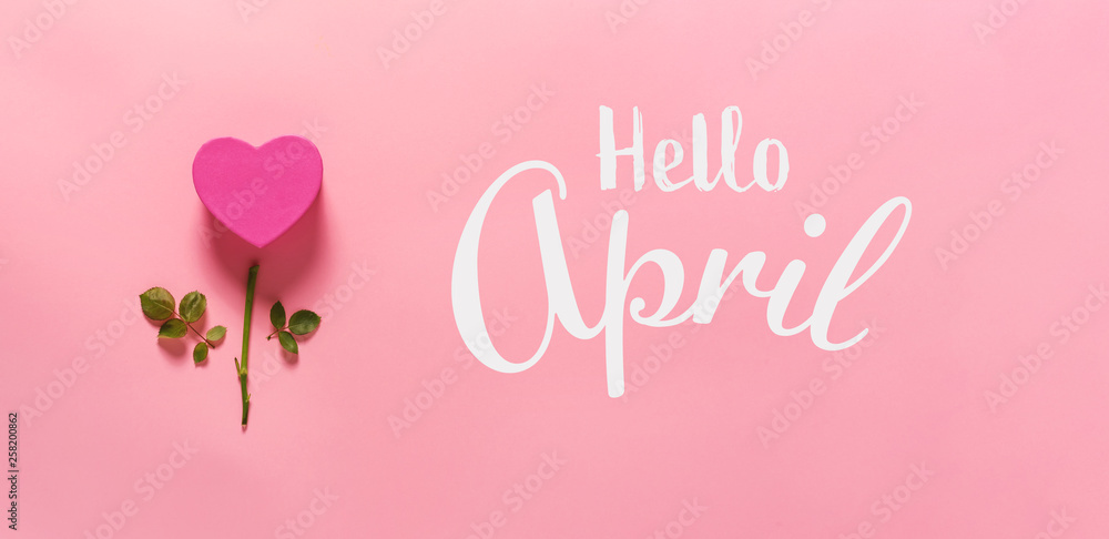 Hello April message with heart flower俯视平面躺