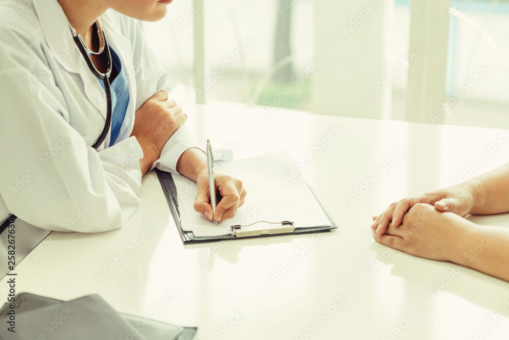 Female patient visits woman doctor or gynecologist during gynaecology check up in office at the hosp