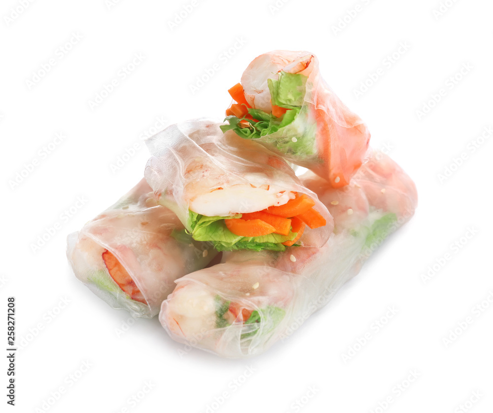 Tasty spring rolls on white background