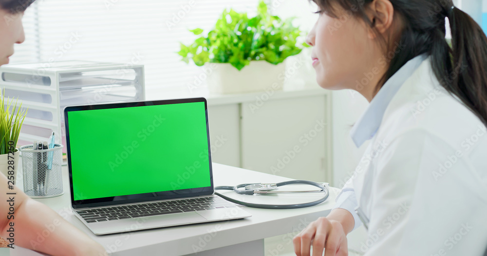 doctor and patient with computer