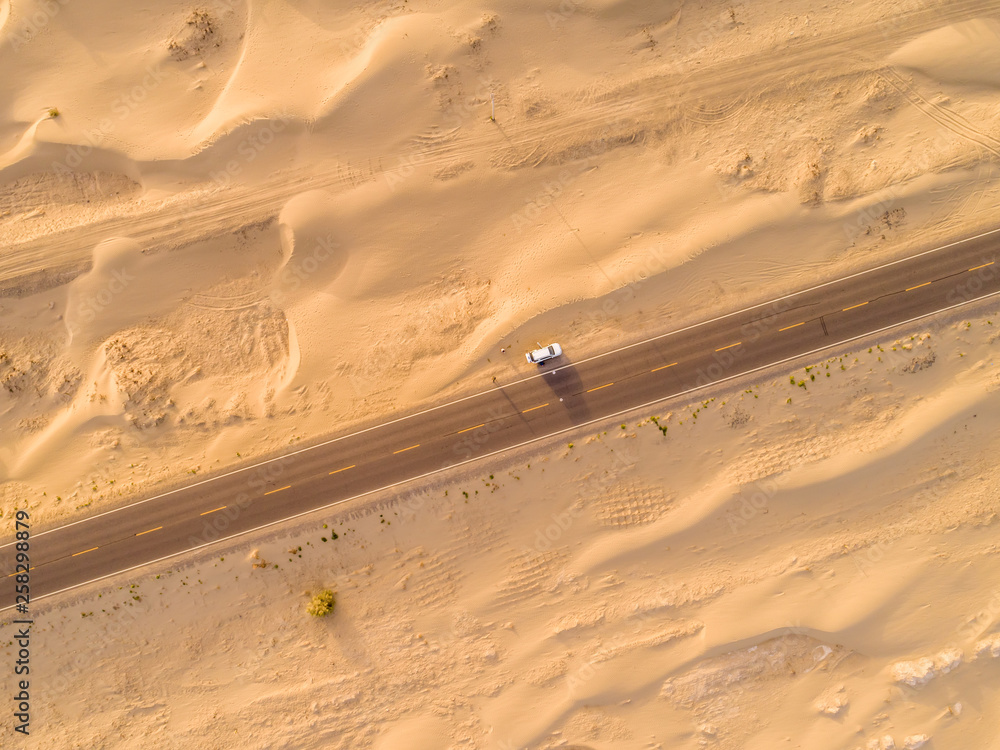 aerial view of highway on the gobi desert xinjiang， 