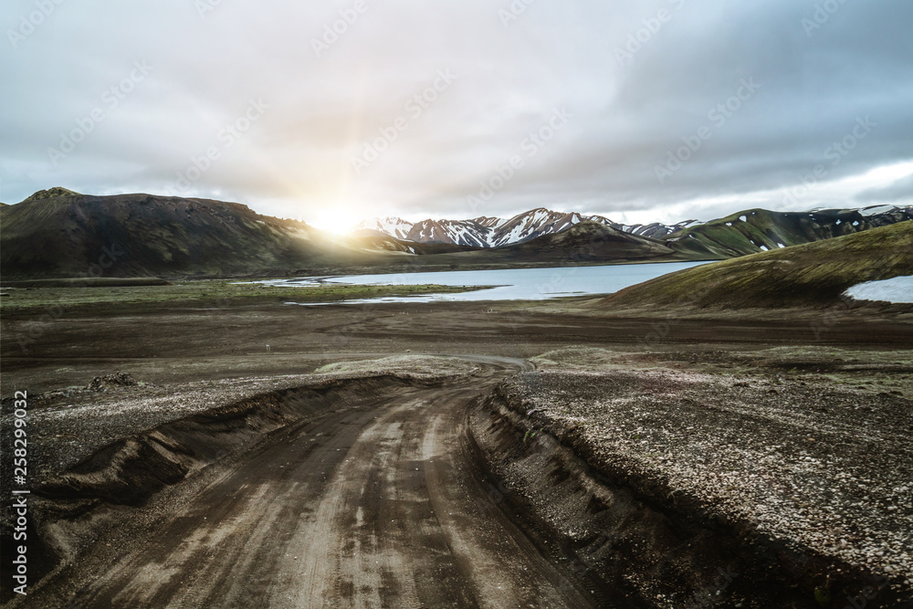 Beautiful Landmanalaugar gravel dust road way on highland of Iceland, Europe. Muddy tough terrain fo