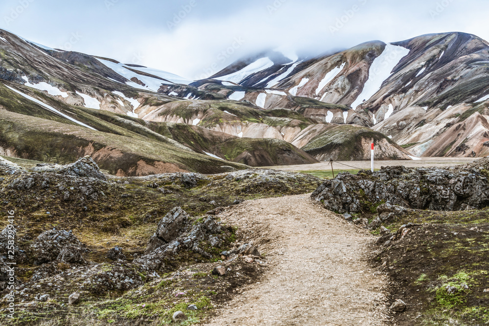 Beautiful Landmanalaugar gravel dust road way on highland of Iceland, Europe. Muddy tough terrain fo